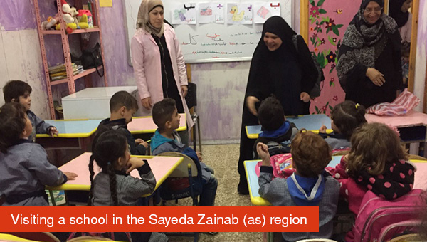 WF-aid visiting a school